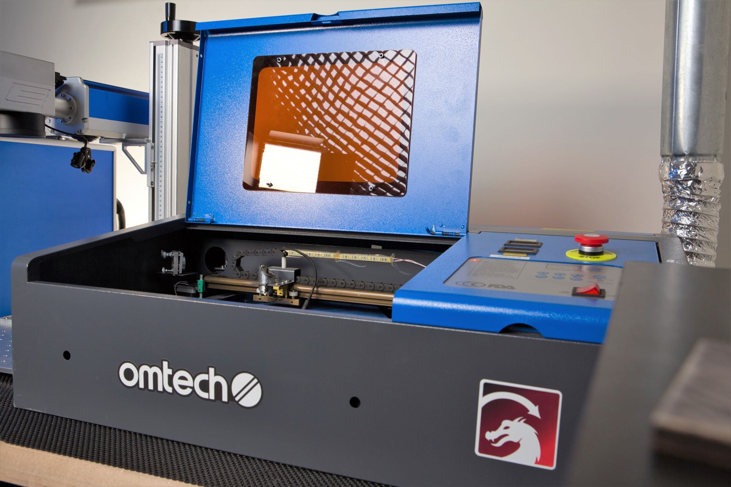 OMTech Laser Cutter vs Cricut: Upgrade Your Cutting Machine